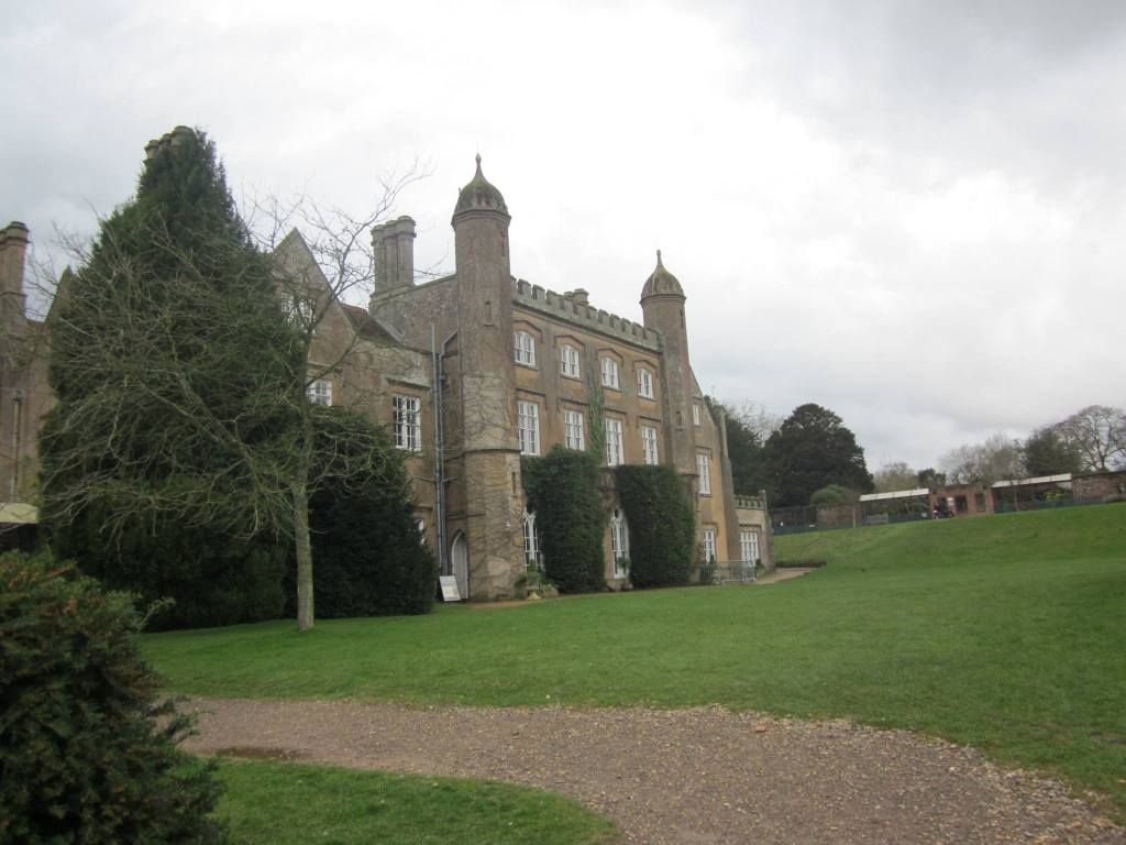 An English period building in a scenic countryside setting