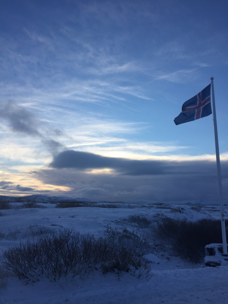 An Icelandic snow-scape with the Icelandic flag